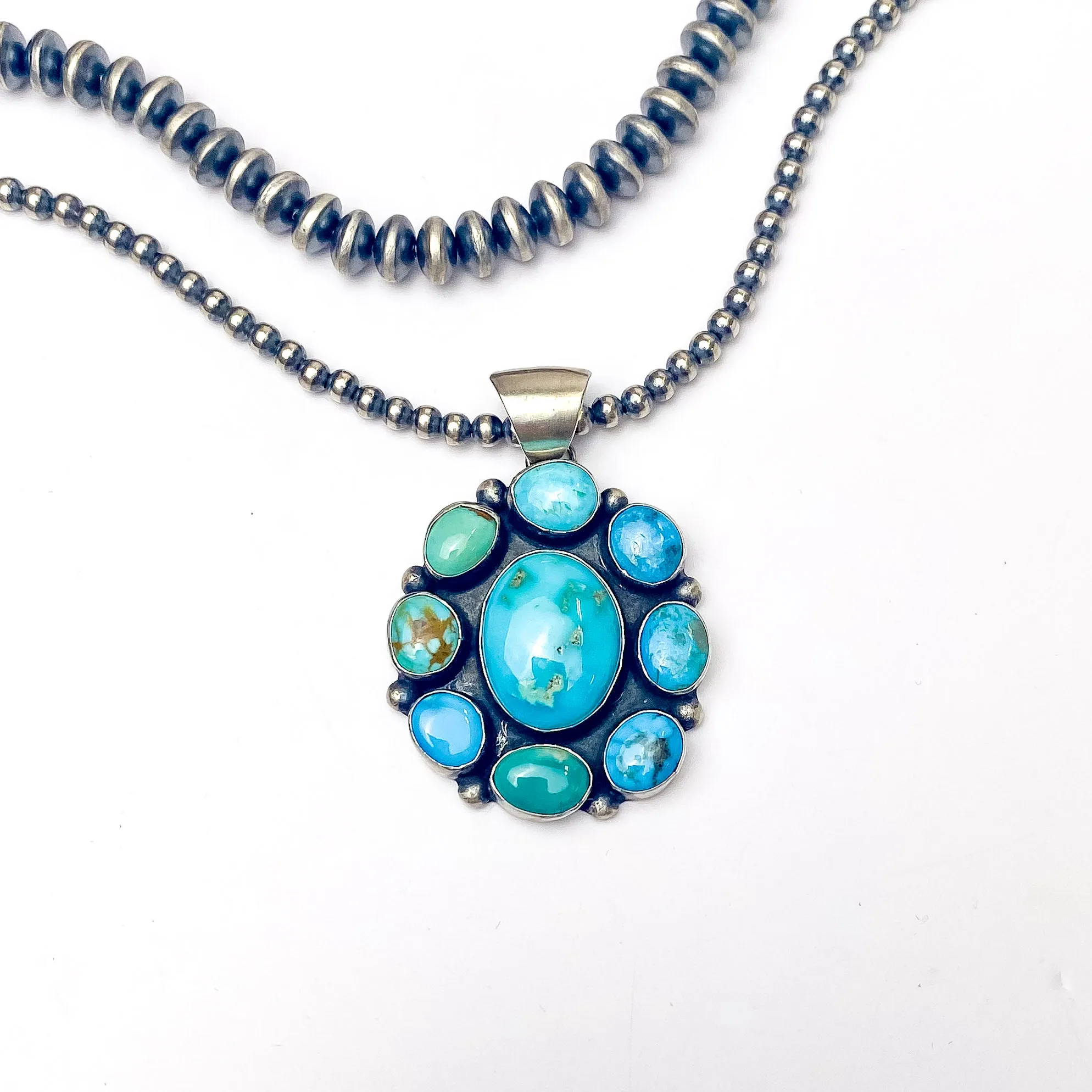 Augustine Largo | Navajo Handmade Sterling Silver Cluster Pendant with Kingman Turquoise Stone